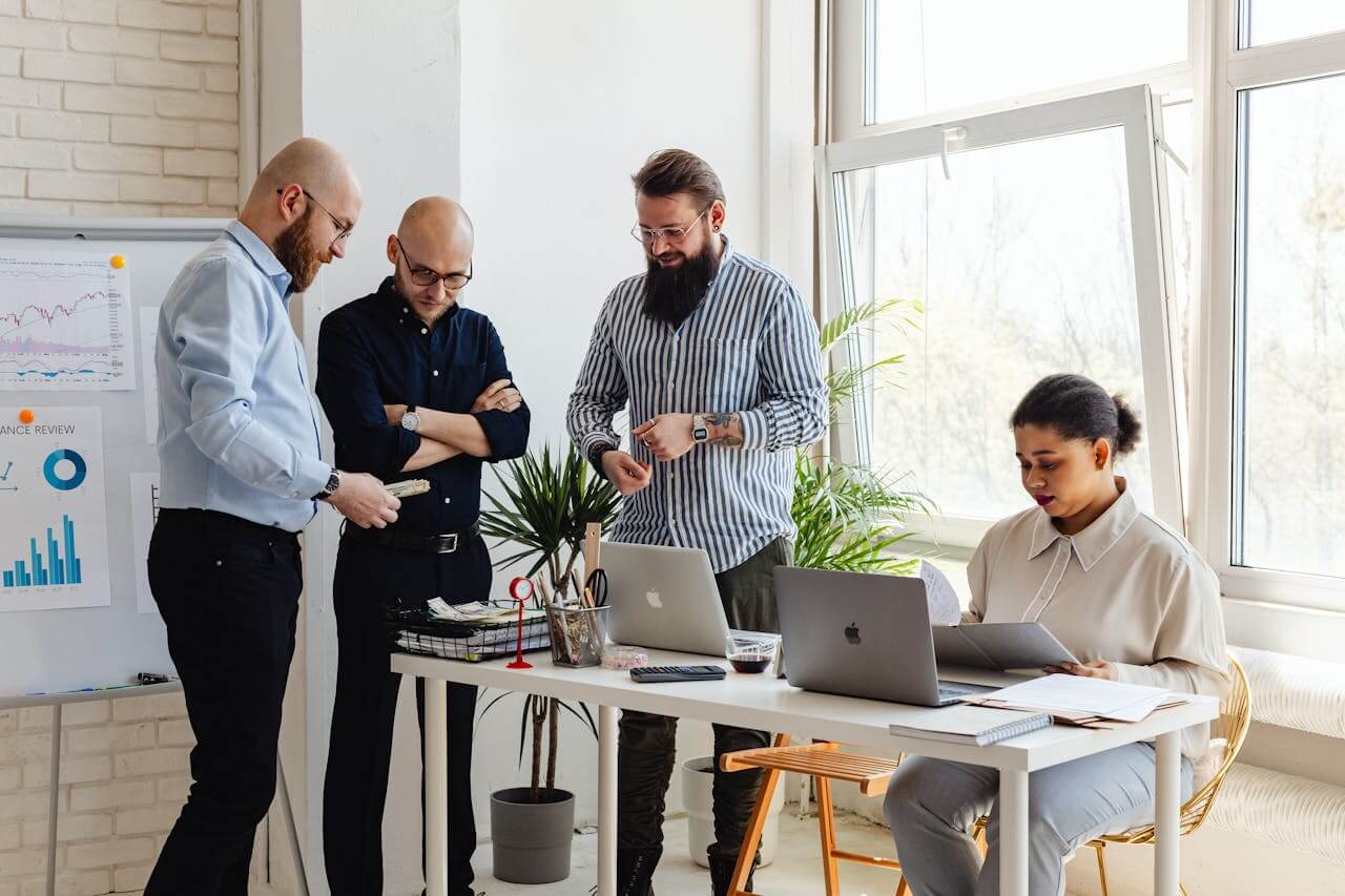 People sitting and standing in the office, team, group.